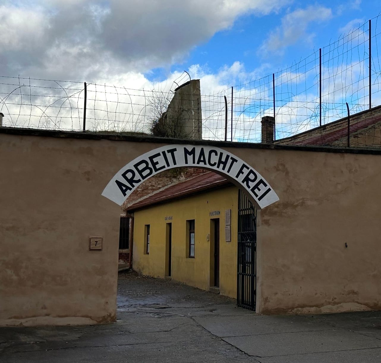 Archway that reads "Arbeit Macht Frei"