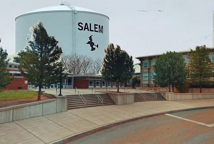 An image of the Witchcraft Heights Elementary School and the Salem Water Tower